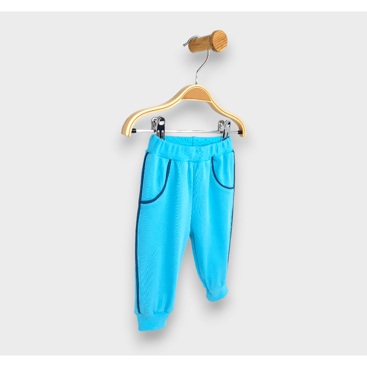 Pantaloni lungi de ploaie pentru bebeluși cu bordură 62-92 cm. Turcoaz