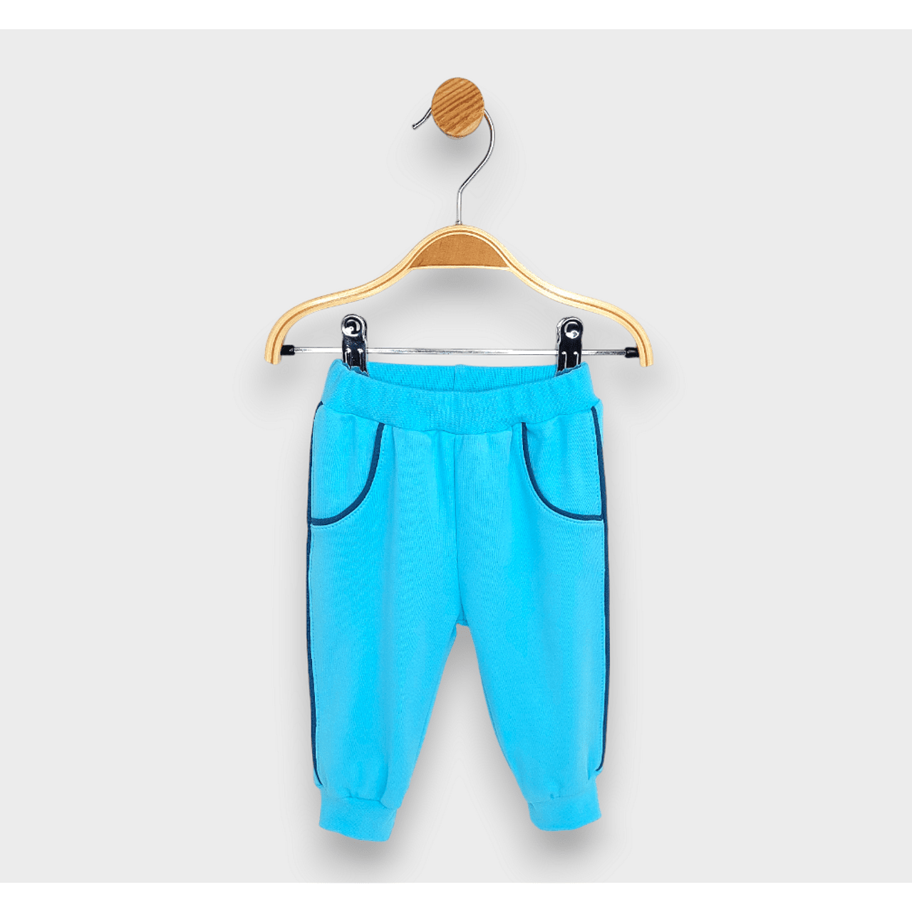 Pantaloni lungi de ploaie pentru bebeluși cu bordură 62-92 cm. Turcoaz