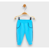 Pantaloni lungi de ploaie pentru bebeluși cu bordură 62-92 cm. Turcoaz