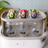 Ортодонтични Залъгалки Tommee Tippee Fun Friends, 18-36М, Син Заек/Зелена Катерица + Кутия За Стерилизиране